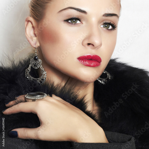 Photo: beautiful blond woman.Jewelry and Beauty.red lips beautiful blond woman.Jewelry and Beauty.red lips