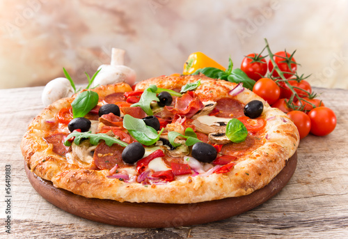 Photo: Delicious italian pizza Delicious italian pizza