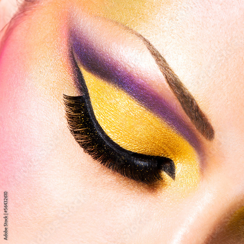 Photo: Beautiful face of a woman with fashion makeup Beautiful face of a woman with fashion makeup