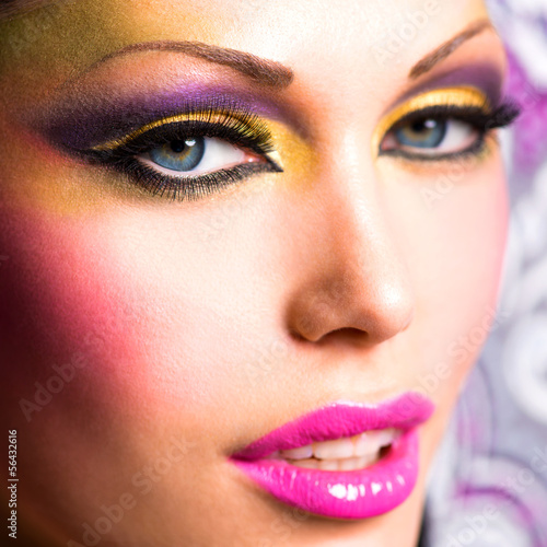 Photo: Beautiful face of a woman with fashion makeup Beautiful face of a woman with fashion makeup