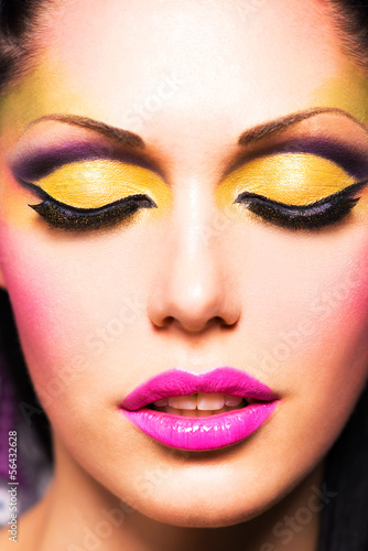 Photo: Beautiful face of a woman with fashion makeup Beautiful face of a woman with fashion makeup