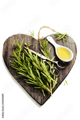 Photo: Fresh spices on heart shaped cutting board Fresh spices on heart shaped cutting board