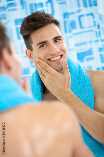 Photo: men touching his soft cheek men touching his soft cheek