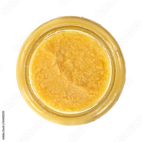 Photo: Opened jar of ginger paste on a white background Opened jar of ginger paste on a white background