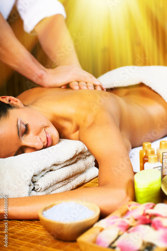 Photo: Beautiful woman having massage. Beautiful woman having massage.