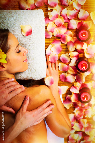 Photo: Beautiful woman having massage. Beautiful woman having massage.