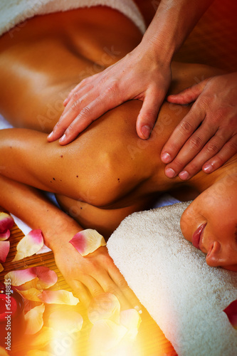 Photo: Beautiful woman having massage. Beautiful woman having massage.