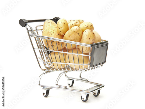 Photo: Shopping cart filled with potatoes Shopping cart filled with potatoes