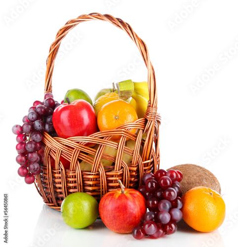 Photo: Different fruits in wicker basket isolated on white Different fruits in wicker basket isolated on white