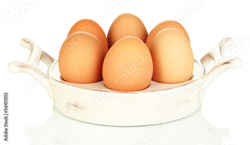 Photo: Eggs in plate for eggs isolated on white Eggs in plate for eggs isolated on white