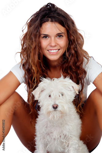 Photo: Happy girl with her dog isolated Happy girl with her dog isolated