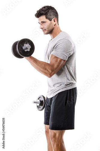 Photo: Athletic man lifting weights Athletic man lifting weights
