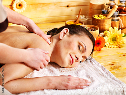 Photo: Woman getting massage . Woman getting massage .