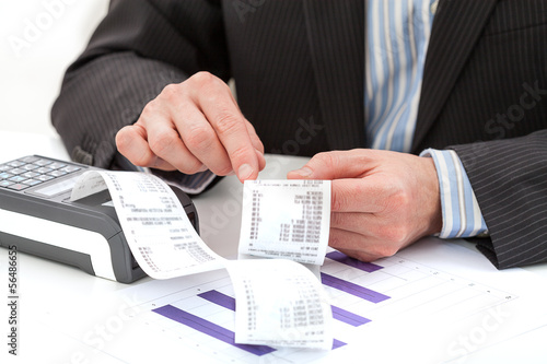 Photo: Analysing the expenses Analysing the expenses