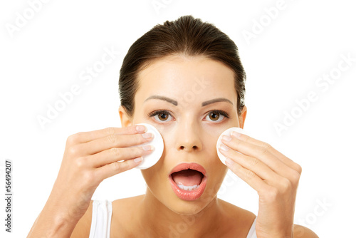 Photo: Beautiful woman with cotton pad Beautiful woman with cotton pad