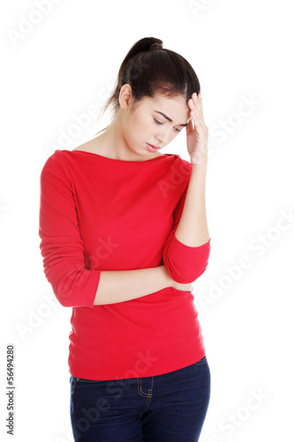 Photo: Young woman have big problem or headache Young woman have big problem or headache