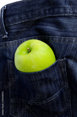 Photo: Green apple in Jeans pocket Green apple in Jeans pocket
