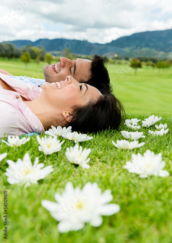 Photo: Couple daydreaming outdoors Couple daydreaming outdoors