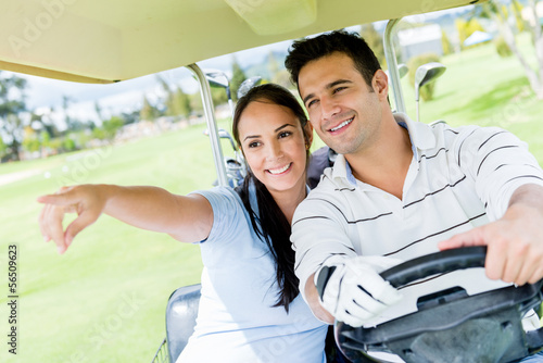 Photo: Couple at the golf course Couple at the golf course
