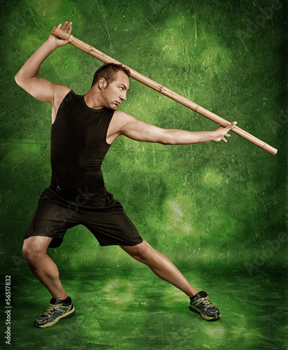 Photo: Mann beim Kampfsport Mann beim Kampfsport