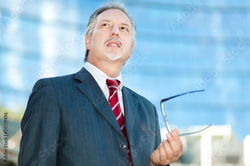 Photo: Mature businessman outdoor Mature businessman outdoor