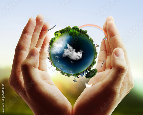 Photo: earth globe in his hands earth globe in his hands