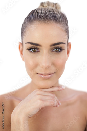 Photo: Amused woman looking at camera Amused woman looking at camera