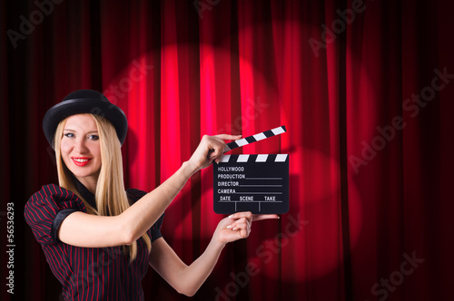 Photo: Woman gangster with movie clapper Woman gangster with movie clapper