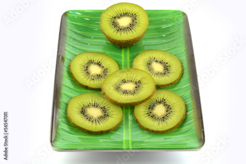 Photo: kiwi slice on white kiwi slice on white