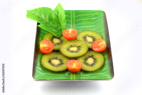 Photo: kiwi slice on white kiwi slice on white