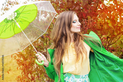 Photo: Pretty girl with transparent umbrella Pretty girl with transparent umbrella