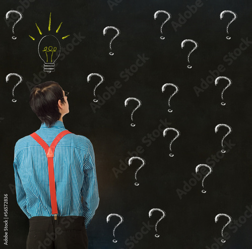 Photo: Nerd businessman chalk exclamation marks ideas Nerd businessman chalk exclamation marks ideas