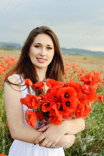 Photo: young woman with flowers young woman with flowers
