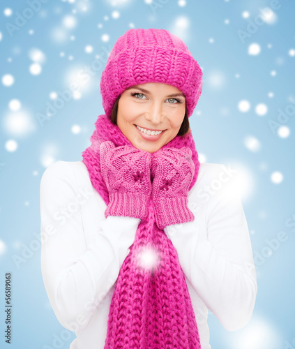 Photo: woman in hat, muffler and mittens woman in hat, muffler and mittens