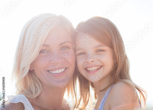 Photo: happy mother and child girl happy mother and child girl