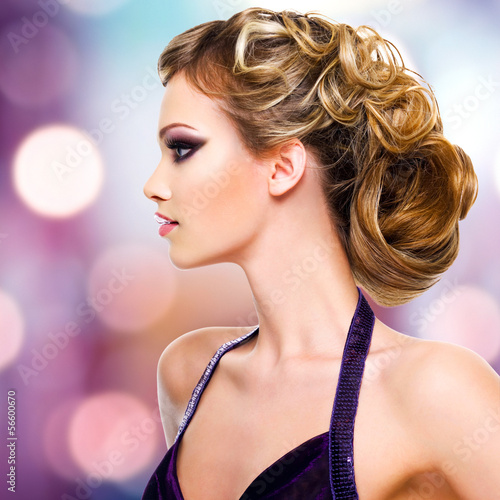 Photo: Profile portrait of woman with fashion hairstyle Profile portrait of woman with fashion hairstyle