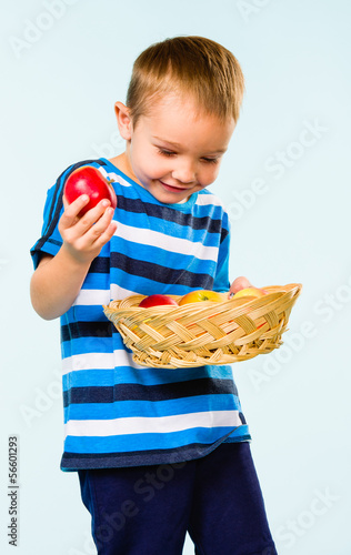 Photo: Boy and fruit basket Boy and fruit basket