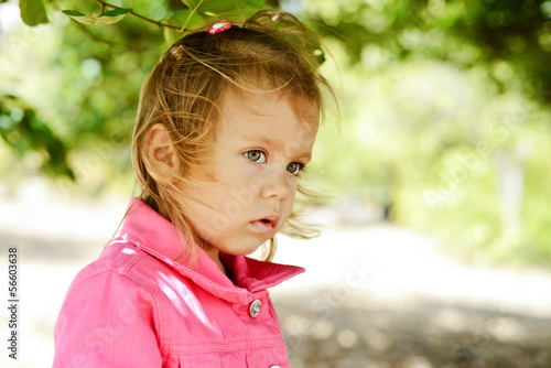 Photo: toddler girl in windy weather toddler girl in windy weather