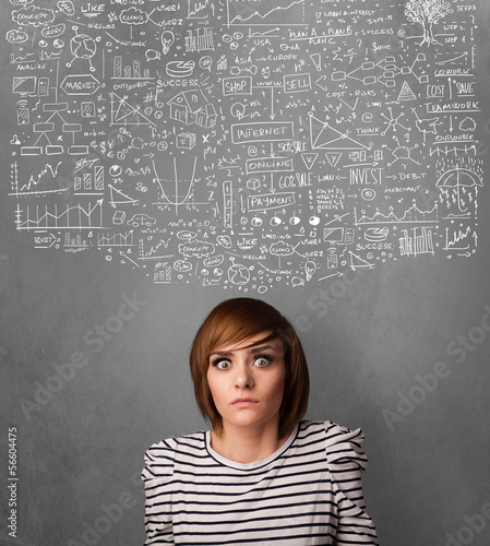 Photo: Young woman gesturing with sketched charts above her head Young woman gesturing with sketched charts above her head