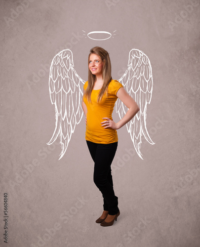 Photo: Cute girl with angel illustrated wings Cute girl with angel illustrated wings