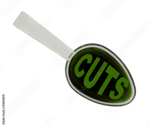 Photo: Spoonful of economic medicine - budget cuts isolated Spoonful of economic medicine - budget cuts isolated