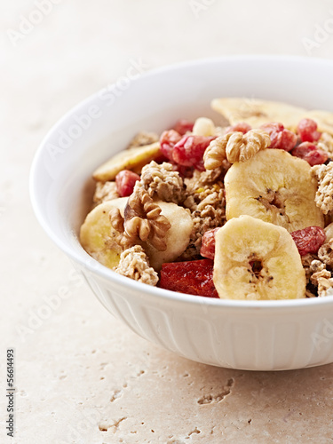 Photo: Granola with dried fruits in a bowl Granola with dried fruits in a bowl