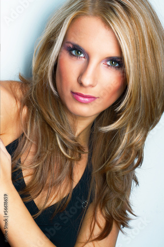 Photo: Portrait of pretty young woman Portrait of pretty young woman