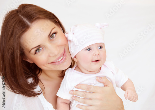 Photo: Young mother with baby boy Young mother with baby boy