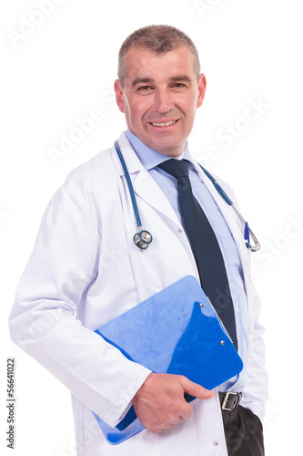 Photo: smiling old doctor holding a blue notepad smiling old doctor holding a blue notepad