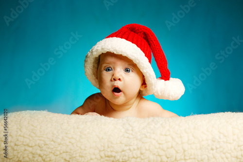 Photo: little cute baby with santa hat little cute baby with santa hat