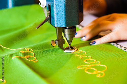 Photo: Lady hand at sewing Lady hand at sewing