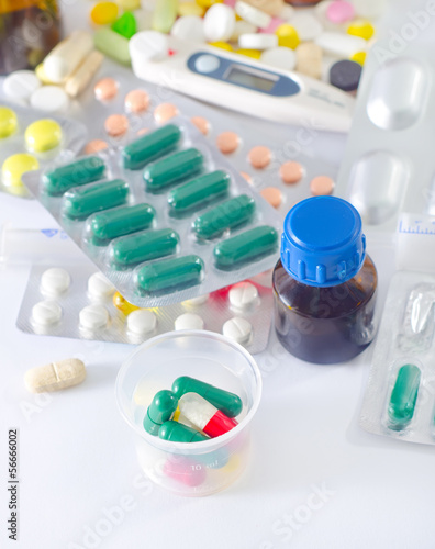 Photo: color pills and medical bottle color pills and medical bottle