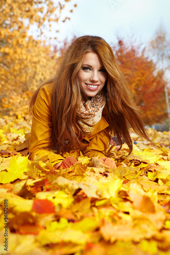 Photo: autumn woman on leafs autumn woman on leafs