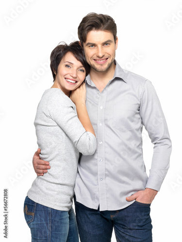 Photo: Portrait of happy couple isolated on white Portrait of happy couple isolated on white